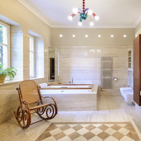 Embrace your inner Roman emperor and have a leisurely bath in the large tub