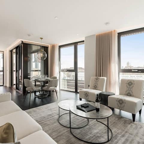Relax in a bright living space with far-reaching city views