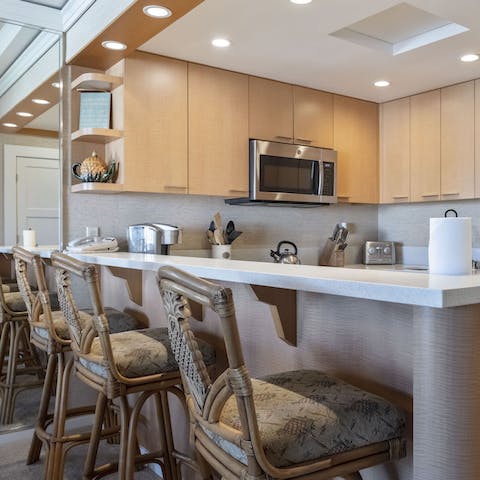 Take morning coffee at the sleek breakfast bar