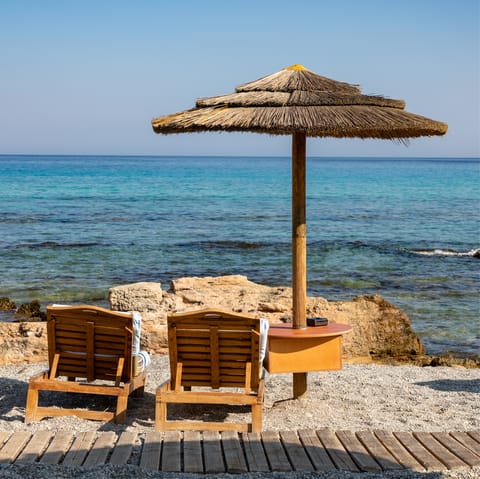 Spend sunny afternoons at the picturesque beach, just a short drive away