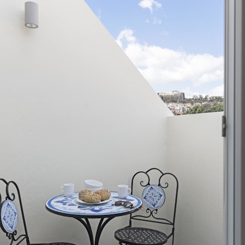Sip your morning coffee from the private terrace
