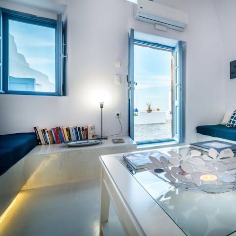 Select something from the small library of holiday reads throughout the villa