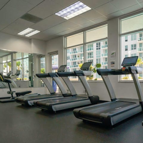 Break a sweat with a morning workout in the shared gym