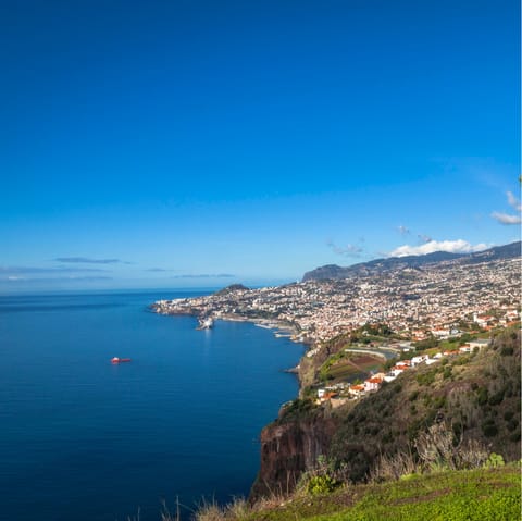 Stay in Funchal, just 1km from the pebble and black sands of Formosa Beach