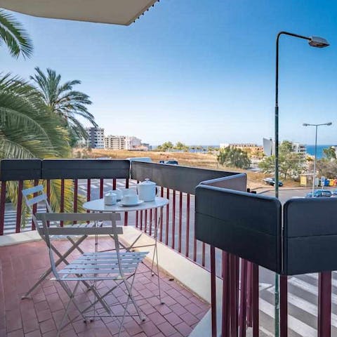 Gaze out at the ocean views while breathing in the fresh air from the balcony