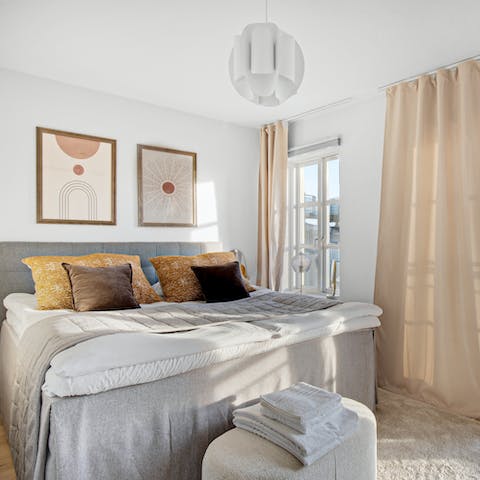 Gaze out over the neighbourhood from the comfort of your bed