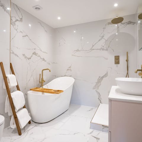 Recover from the day's outdoor exploits in the elegant bathtub