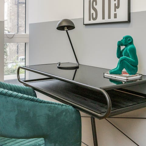Catch up on work at the second bedroom's handy desk space