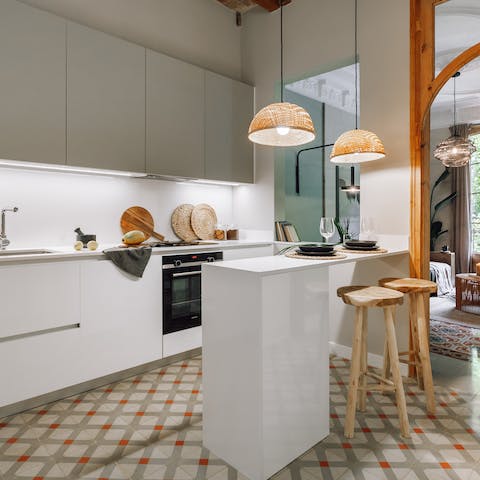Whip up a spread of local meats, cheeses, and olives in the chic kitchen
