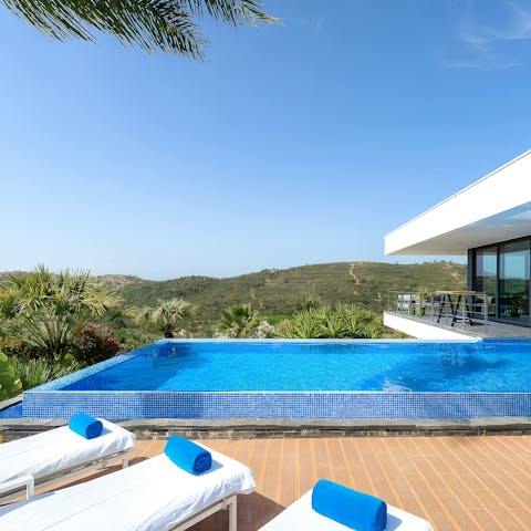 Soak up the incredible views from the infinity pool