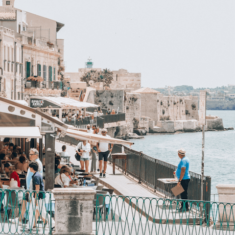 Stay on the island of Ortigia, walking distance to landmarks