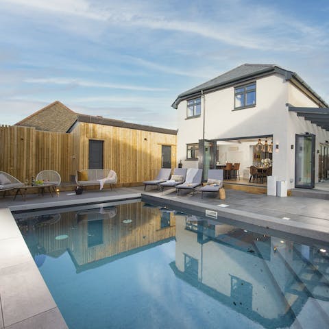 Slip into your swimwear and go for a dip in the heated swimming pool
