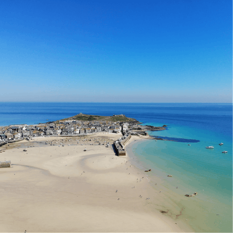 Walk half an hour along the South West Coast Path to reach the town of St Ives