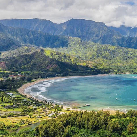 Dive into the turquoise waters at nearby Puu Poa beach