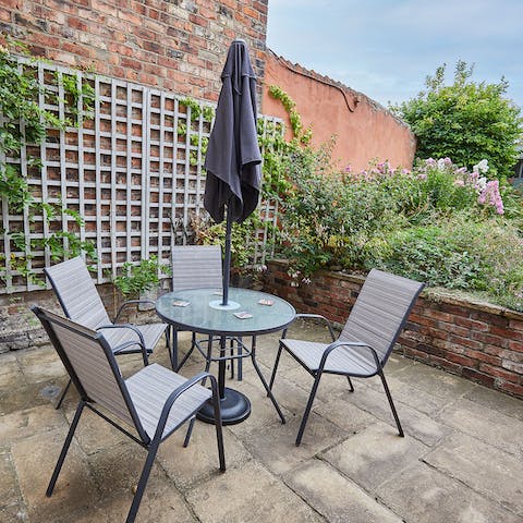 Dine alfresco on the patio and make the most of the summer months