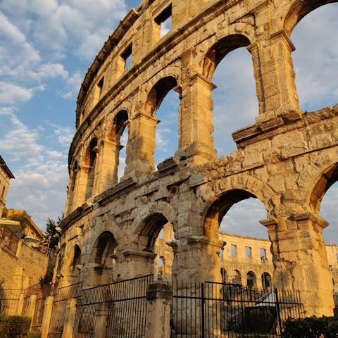 Take a historical tour of Pula, twenty-minute drive away