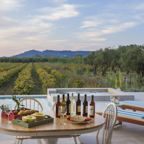 Unwind after a busy day with a glass of wine in the Jacuzzi