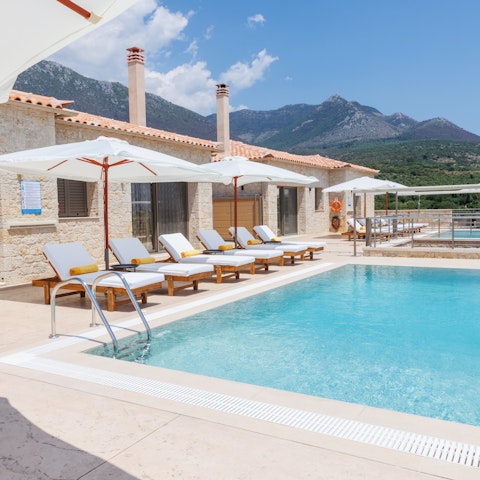 Have a dip in the pool and dry off on a sun lounger