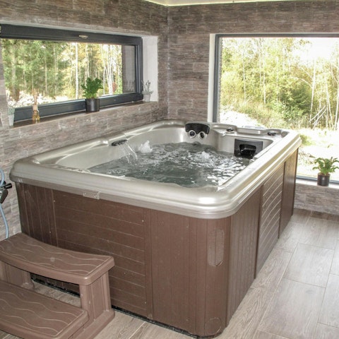 Unwind with a soak in the private hot tub