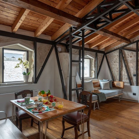 Enjoy pre-dinner drinks in the the light-filled apartment