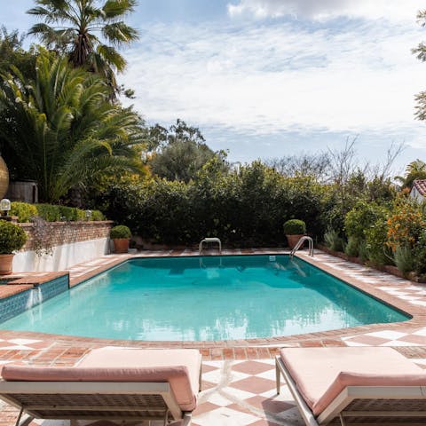 Feel a wonderful sense of wellbeing while relaxing by the pool