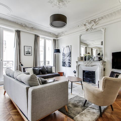 Feel positively regal as you relax with a glass of wine in the elegant living room