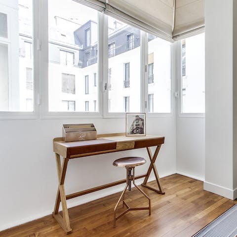 Catch up on work at the main bedroom's desk