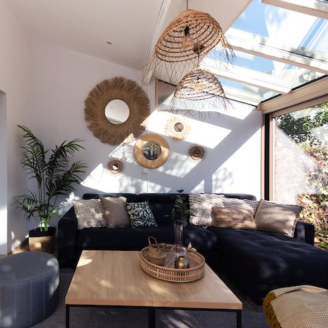 Delight in the sunshine as you stretch out on the sofa with a good book