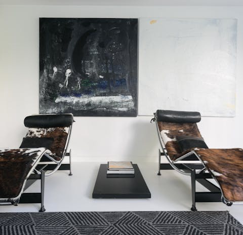 Recline on a cow hide chair with an excellent book