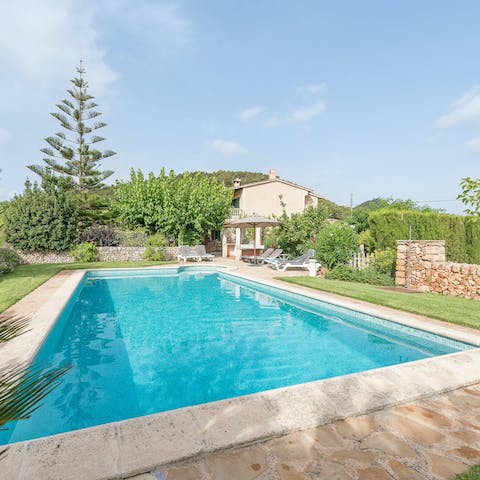 Enjoy a refreshing swim in the private outdoor pool on sunny days