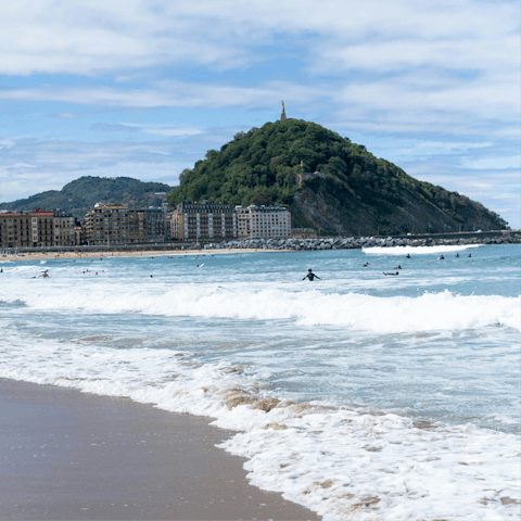 Catch some waves at Zurriola Beach, five minutes away