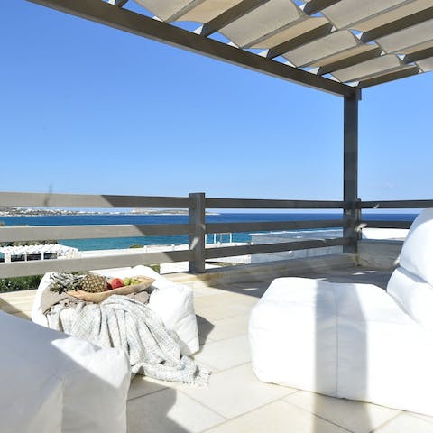 Admire the sea views from the comfy beanbag loungers on your balcony