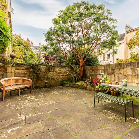 Unwind in the garden with a glass of cider