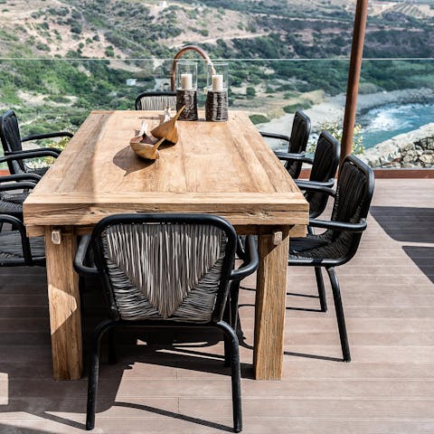 Dine on the terrace and look out over the mountains and sea