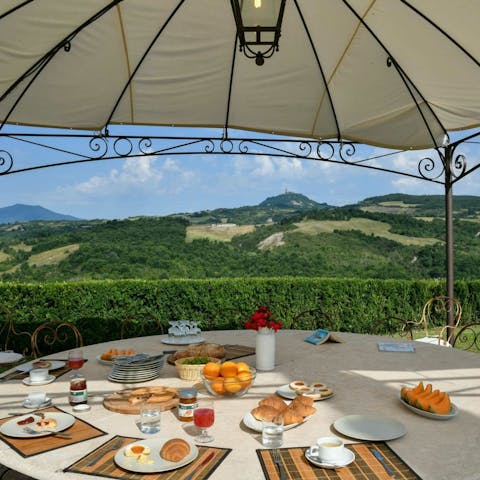 Watch the sun set over the hills as you tuck into a homemade dinner