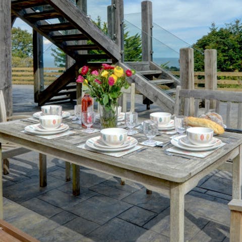 Gather your ensemble for an alfresco dinner at sunset