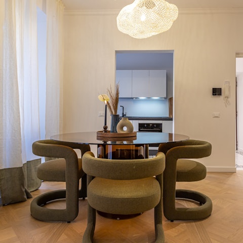 Enjoy a glass of Prosecco at the dining table