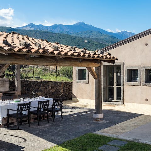 Dine in the shadow of Mt Etna without leaving your villa