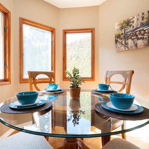 A window encircled dinner nook