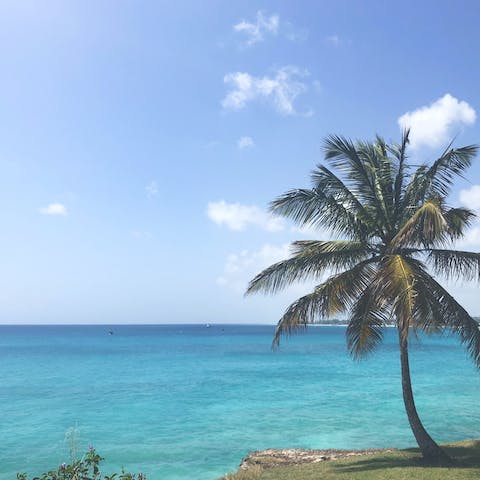 Spend the day on Sandy Lane Beach, just a ten-minute walk away