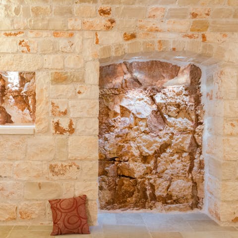 The stone facade and interiors of the home are truly remarkable