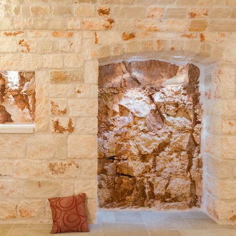 The stone facade and interiors of the home are truly remarkable
