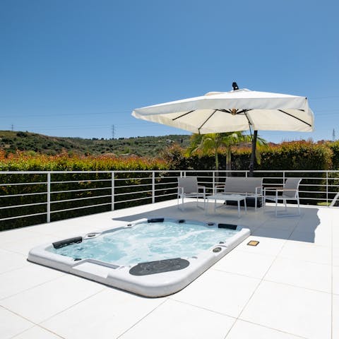 Admire the scenery from the warmth of the jacuzzi