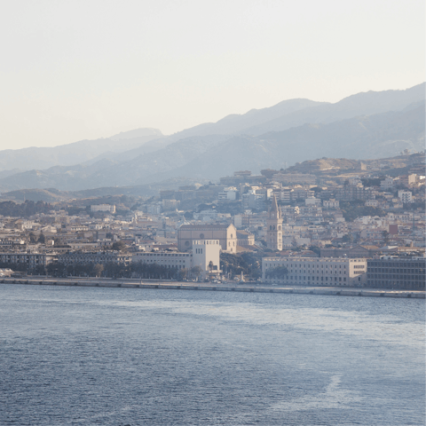 Take a drive around the northern coast of Sicily to the city of Messina