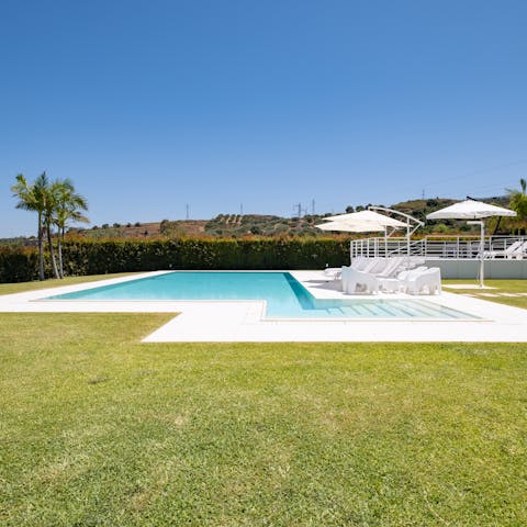Spend the day poolside, in the shade or the water