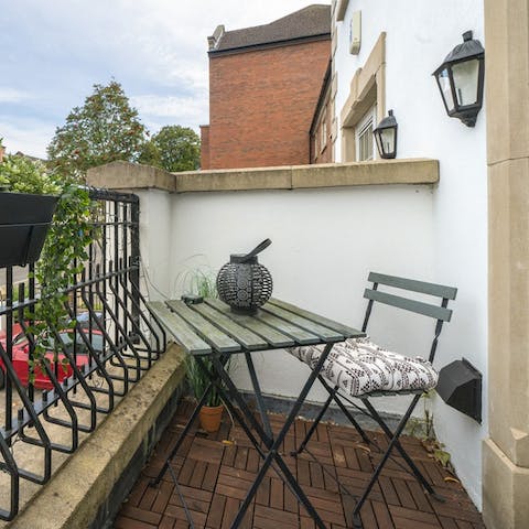 Enjoy your morning coffee on the private balcony