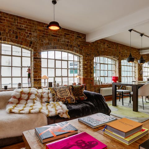 Curl up on the cosy sofa with a glass of wine and a good book