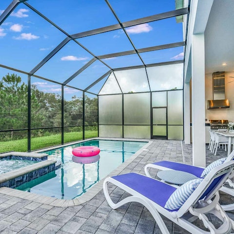 Relax by the private, screened outdoor pool and spa