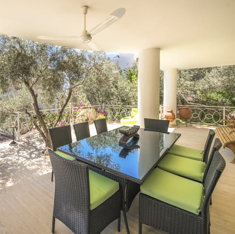 Dine alfresco with loved ones under the shade of the covered terrace