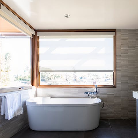 Enjoy a relaxing soak in the tub after a day seeing the sights